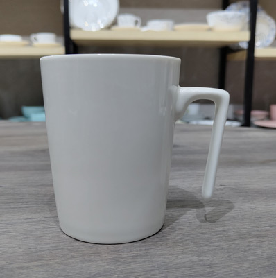 L Handel conical Mug